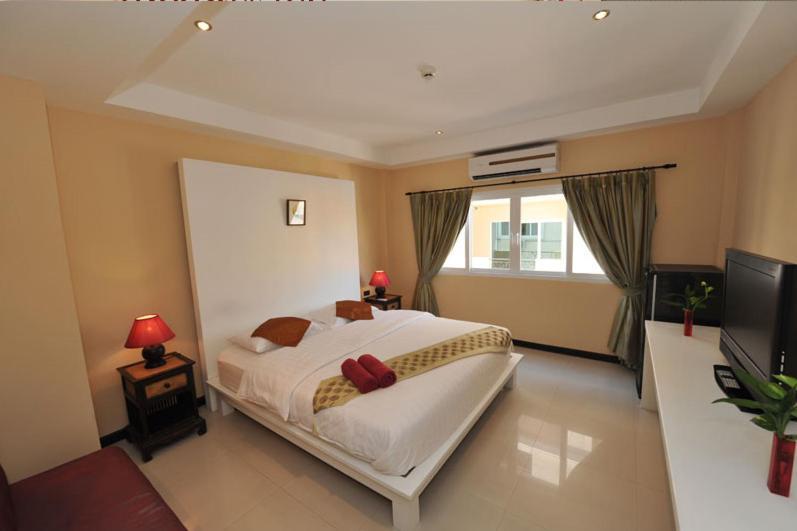 Le Parrots-Inn Praia de Jomtien Exterior foto