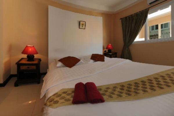 Le Parrots-Inn Praia de Jomtien Quarto foto