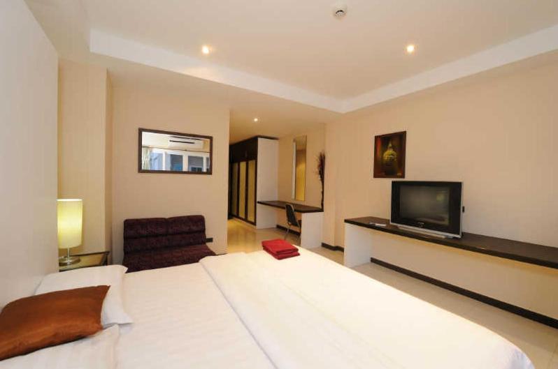Le Parrots-Inn Praia de Jomtien Quarto foto